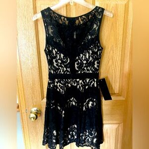 Stunning nwt black and nude lace dress size 4